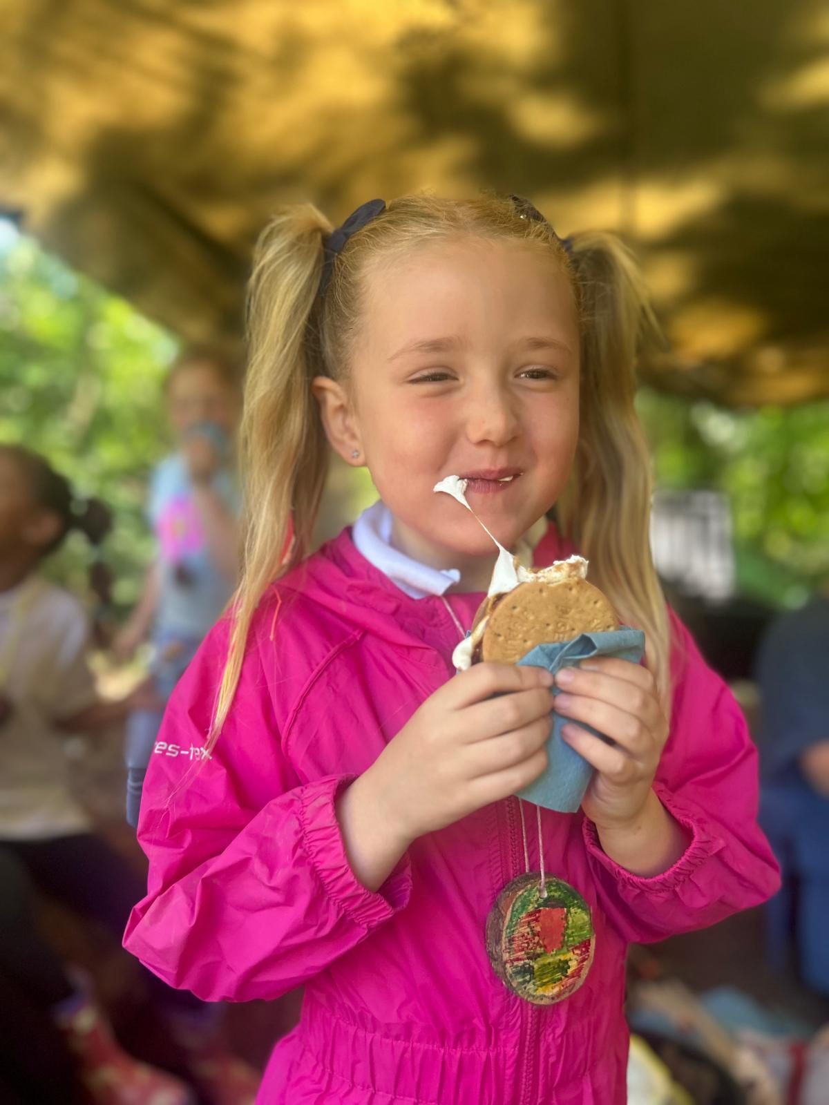 Pupil enjoying an outdoor snack