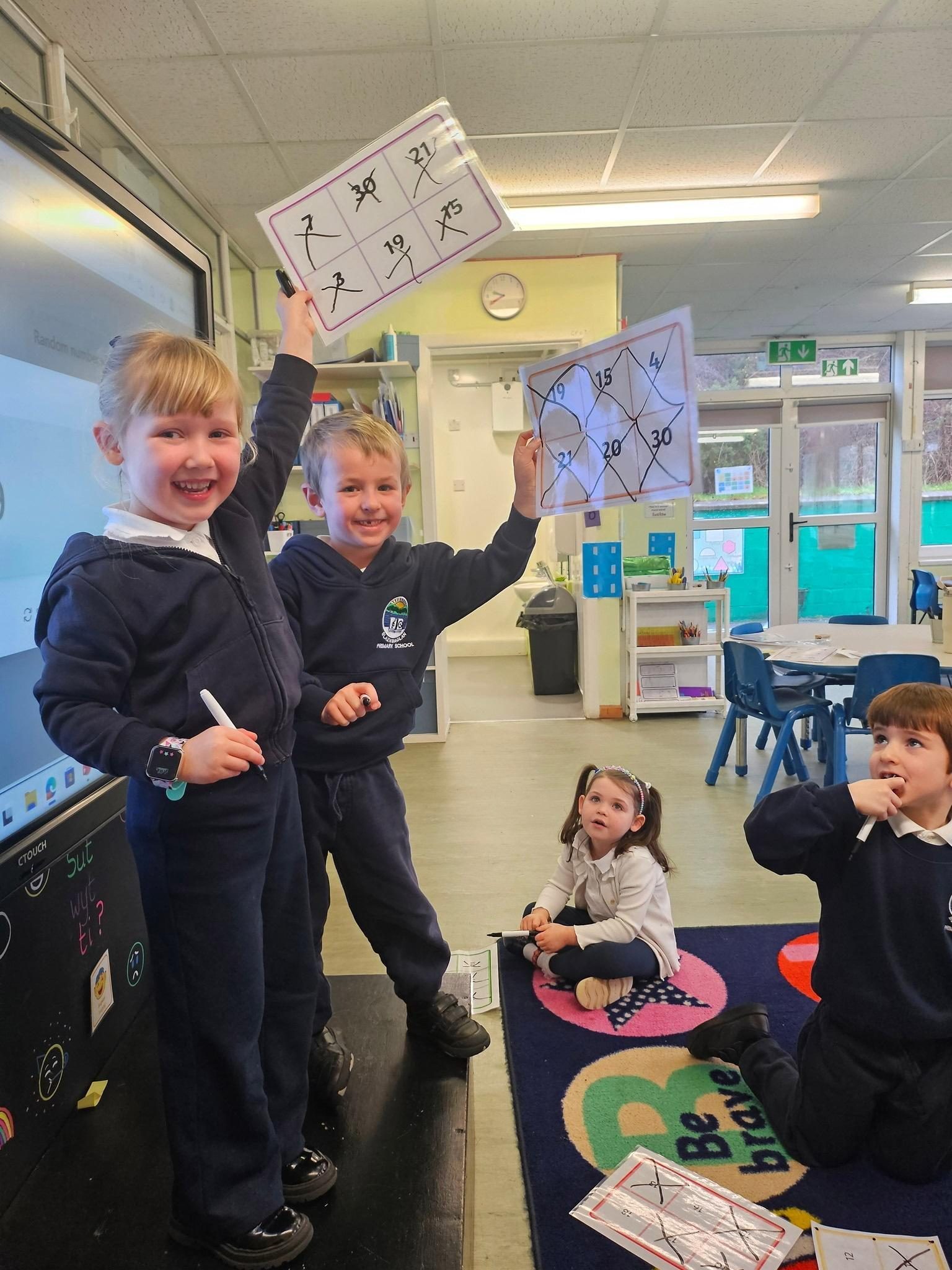 Pupils taking part in a classroom activity