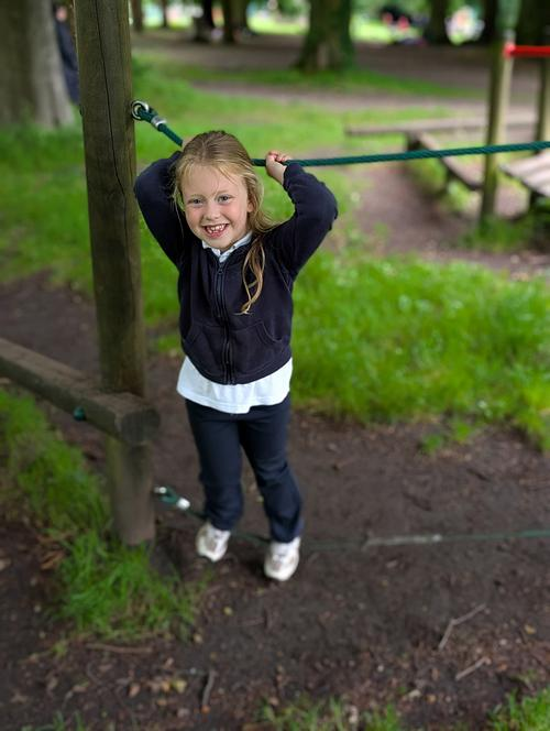 Pupil enjoying the Forest School ropes