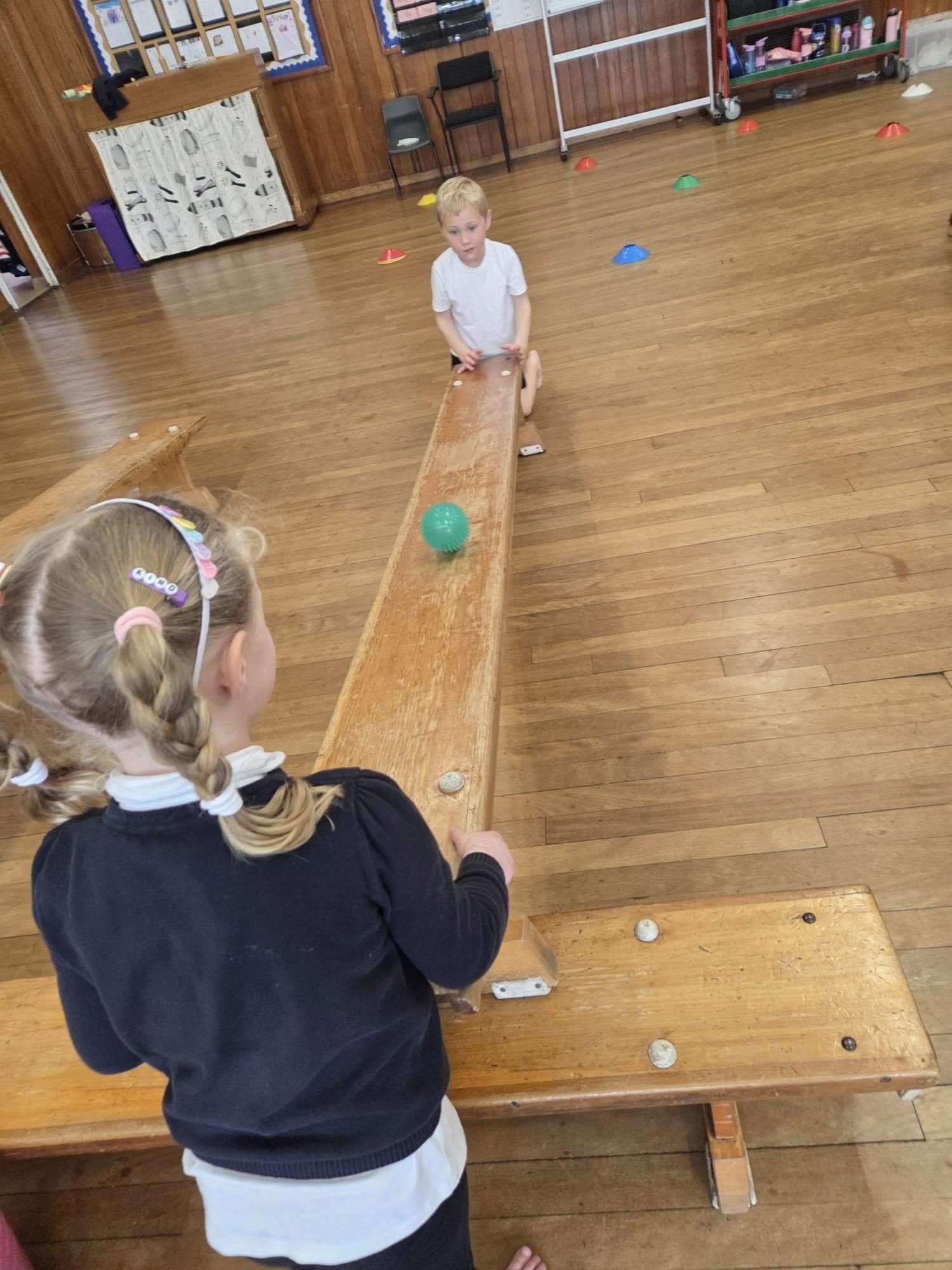 Pupils working together during a physical activity