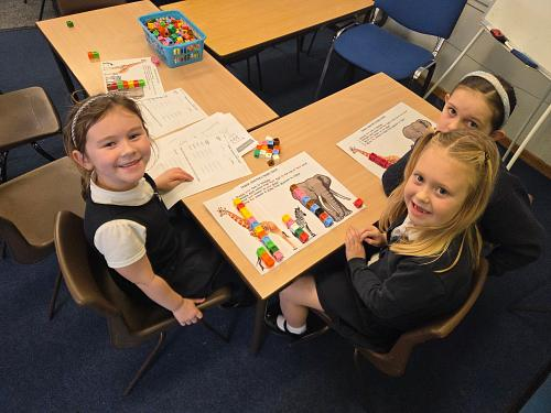 Pupils collaborating on a classroom project