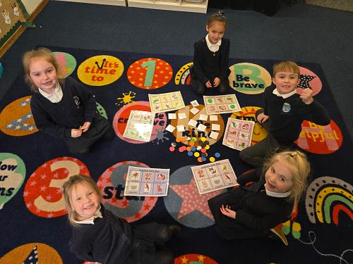 Pupils working together on a learning game