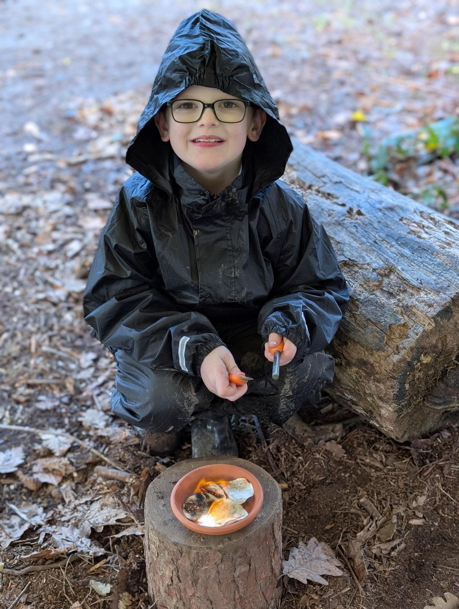 Pupil taking part in a Forest School activity