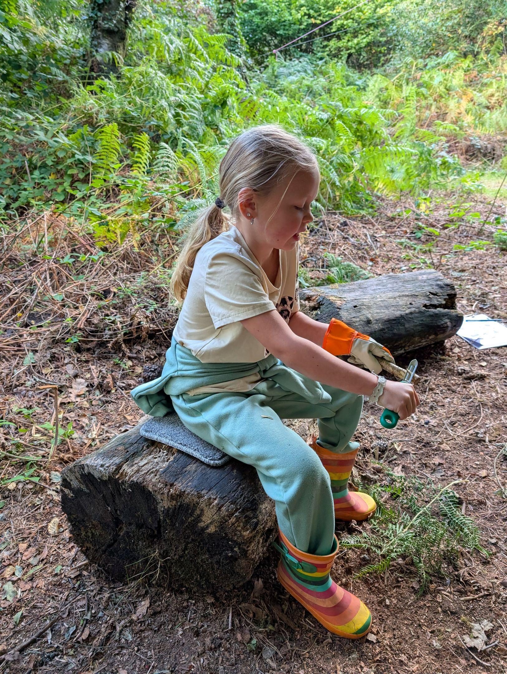 Pupil working on a Forest School activity