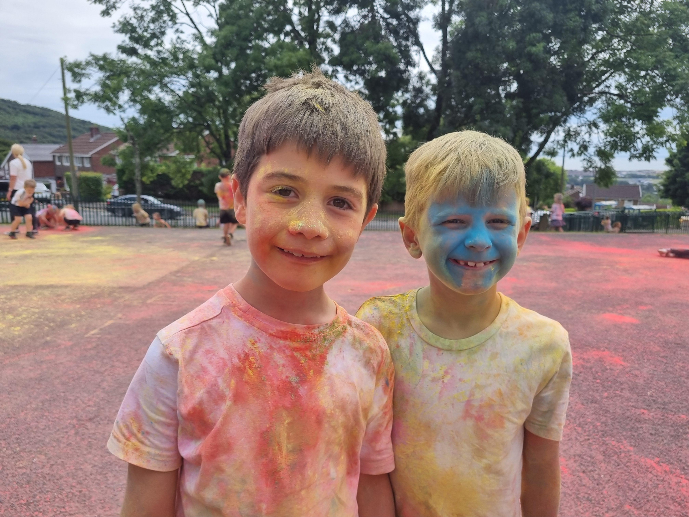 Two pupils with colourful face paint